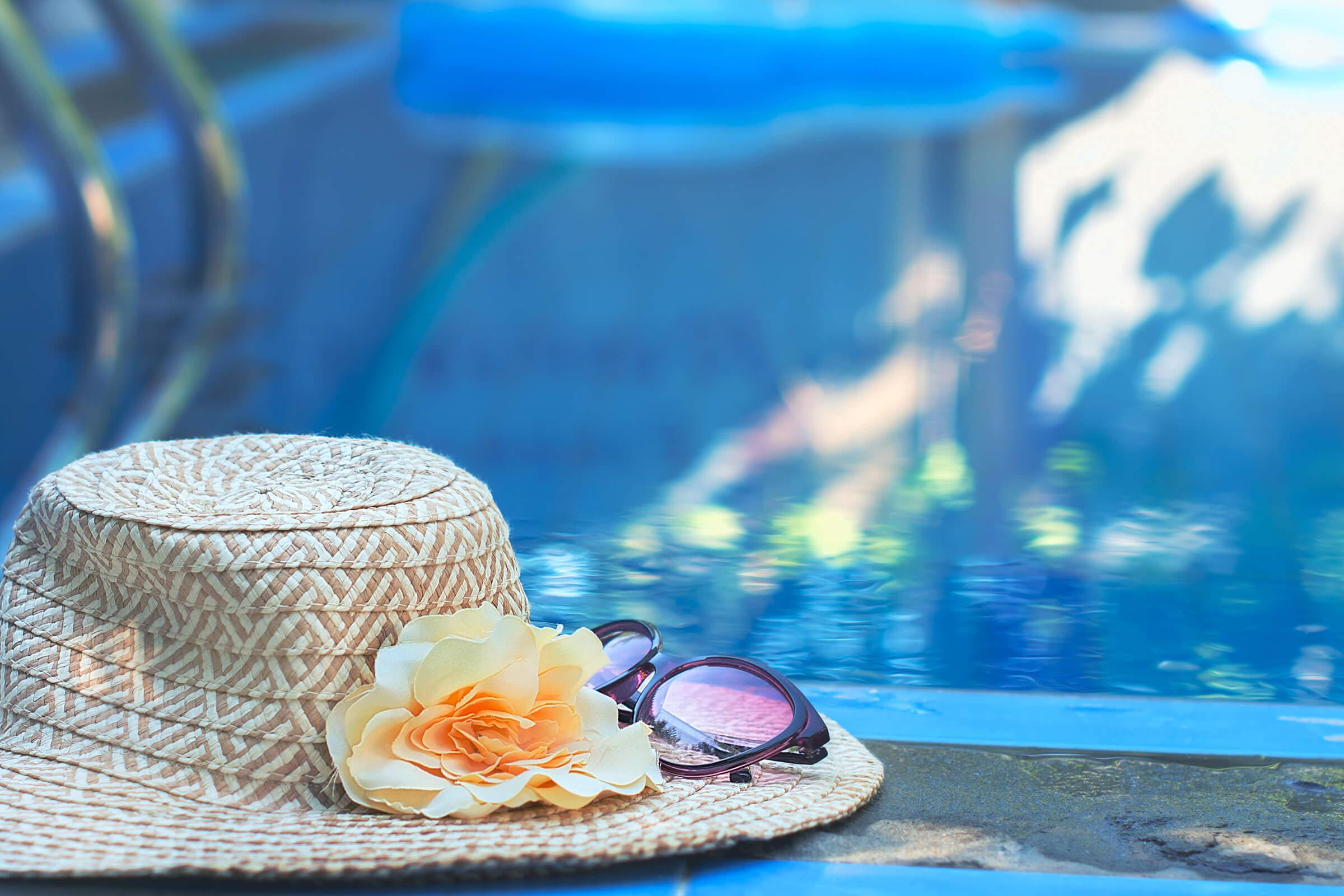 hat and pool-914478524.jpg